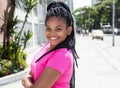 Happy latin woman in a pink shirt Royalty Free Stock Photo