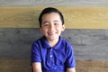 Happy Latino boy with blue t-shirt Royalty Free Stock Photo