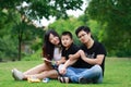 Happy latino family reading book Royalty Free Stock Photo