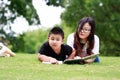 Happy latino family reading book