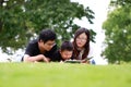 Happy latino family reading book Royalty Free Stock Photo