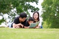 Happy latino family reading book