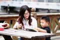 Happy latino family reading book Royalty Free Stock Photo