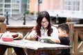 Happy latino family reading book Royalty Free Stock Photo