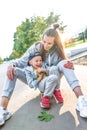 Happy laugh, Mom woman with little boy son of 4-5 years old, having fun enjoying rest, summer autumn in city park Royalty Free Stock Photo