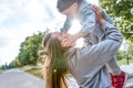 Happy laugh, Mom woman with little boy son 4-5 years old, having fun and enjoying rest, summer autumn in city park Royalty Free Stock Photo