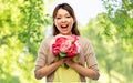 Happy laughing asian woman with bunch of flowers Royalty Free Stock Photo