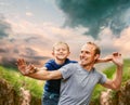 Happy laughing father with son