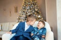 Happy laughing little children. Loving brothers in high spirits looking forward to Christmas. Overjoyed adorable kids Royalty Free Stock Photo