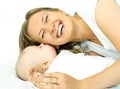 Happy laughing mother with her baby Royalty Free Stock Photo