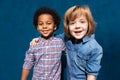 Happy laughing multiracial friends schoolboys.