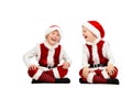 Happy laughing toddler boys in Christmas santa clothes. Isolated white background. Royalty Free Stock Photo