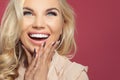 Happy laughing woman, young face closeup. Excited girl on colorful background with copy space Royalty Free Stock Photo