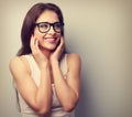 Happy laughing young casual woman holding hands the face. Vintage portrait Royalty Free Stock Photo