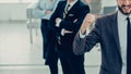 happy leader standing in front of his business team. Royalty Free Stock Photo