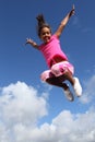 Happy leap of joy great success for young girl