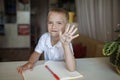 Left-handed showing his left hand with text my left is right, left-hander day celebration