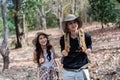 Happy LGBT Lesbian couple Travelers Hiking with Backpacks in forest Trail. LGBT Lesbian Couple Hikers with backpacks Royalty Free Stock Photo