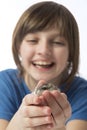 A happy litle girl with a cute hamster