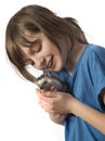 Happy litle girl with her pet African pygmy hedgehog Royalty Free Stock Photo