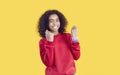 Happy little African American girl celebrating success, smiling and clenching her fists Royalty Free Stock Photo