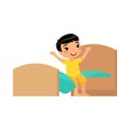 Happy little asian boy is sitting on the bed. Happy baby stretches. Day mode concept. Royalty Free Stock Photo