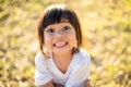 Happy Little asian girl child showing front teeth with big smile and laughing: Healthy happy funny smiling face young adorable Royalty Free Stock Photo