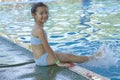 Happy Little Asian Girl At The Pool Royalty Free Stock Photo