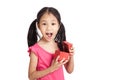 Happy little asian girl surprise with red gift box