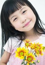 Happy little girl with yellow daisy Royalty Free Stock Photo