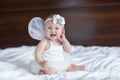 Happy little baby with angel wings Royalty Free Stock Photo