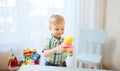 Happy little baby boy with ball clay at home Royalty Free Stock Photo