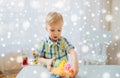 Happy little baby boy with ball clay at home Royalty Free Stock Photo