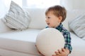 Happy little baby boy with ball at home Royalty Free Stock Photo