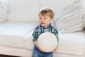 Happy little baby boy with ball at home Royalty Free Stock Photo