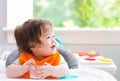 Happy little baby boy eating food Royalty Free Stock Photo