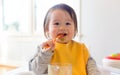 Happy little baby boy eating food Royalty Free Stock Photo