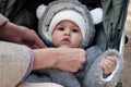 Happy little baby boy making outdoors in winter. Cute toddler in winter cloth. Child having fun on cold day. Winter walk Royalty Free Stock Photo