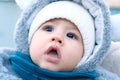 Happy little baby boy making outdoors in winter. Cute toddler in winter cloth. Child having fun on cold day. Winter walk Royalty Free Stock Photo
