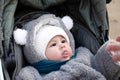 Happy little baby boy making outdoors in winter. Cute toddler in winter cloth. Child having fun on cold day. Winter walk Royalty Free Stock Photo