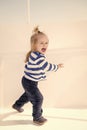 Happy little baby captain on boat, nautical kid fashion