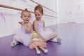 Two adorable little ballerinas at dance class