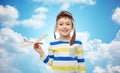 Happy little boy in aviator hat with airplane Royalty Free Stock Photo