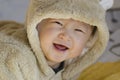 Happy Little Boy in Bear Clothes with Big Smile Royalty Free Stock Photo