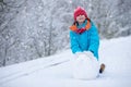 Happy little boy with a big snow globe Royalty Free Stock Photo