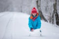 Happy little boy with a big snow globe Royalty Free Stock Photo