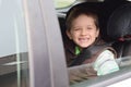 Happy little boy in car safety seat. Royalty Free Stock Photo