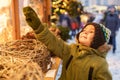 Happy little boy at christmas market in winter Royalty Free Stock Photo