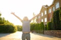 Happy little boy enjoying warm sunny summer day. Active child playing on the street of small town. Freedom  rest  vacation and Royalty Free Stock Photo