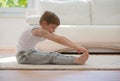 Happy little boy exercising at home Royalty Free Stock Photo